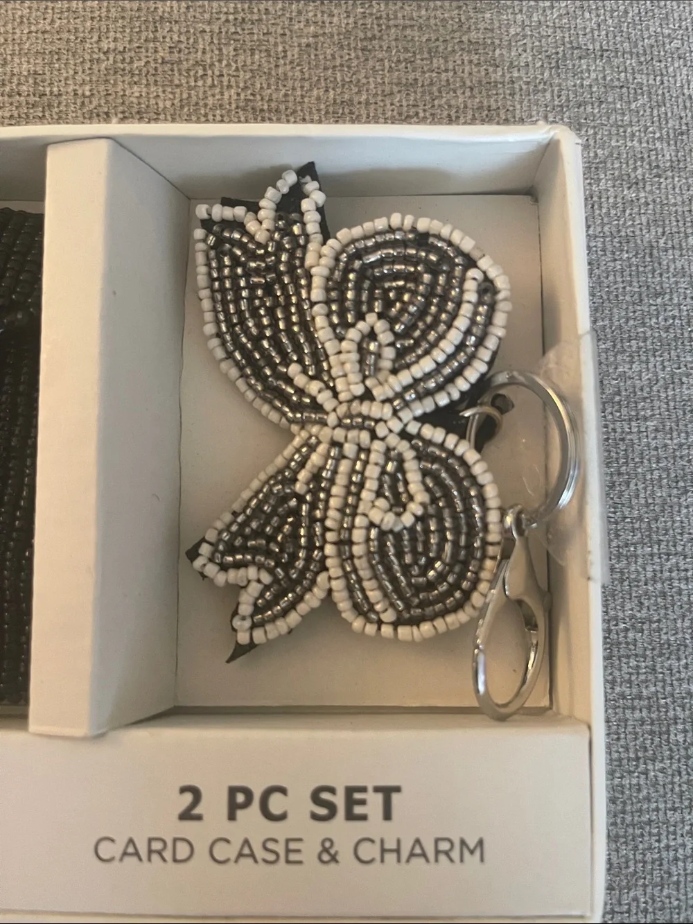 Rachel Zoe Black and White Beaded Card Case with Butterfly Charm